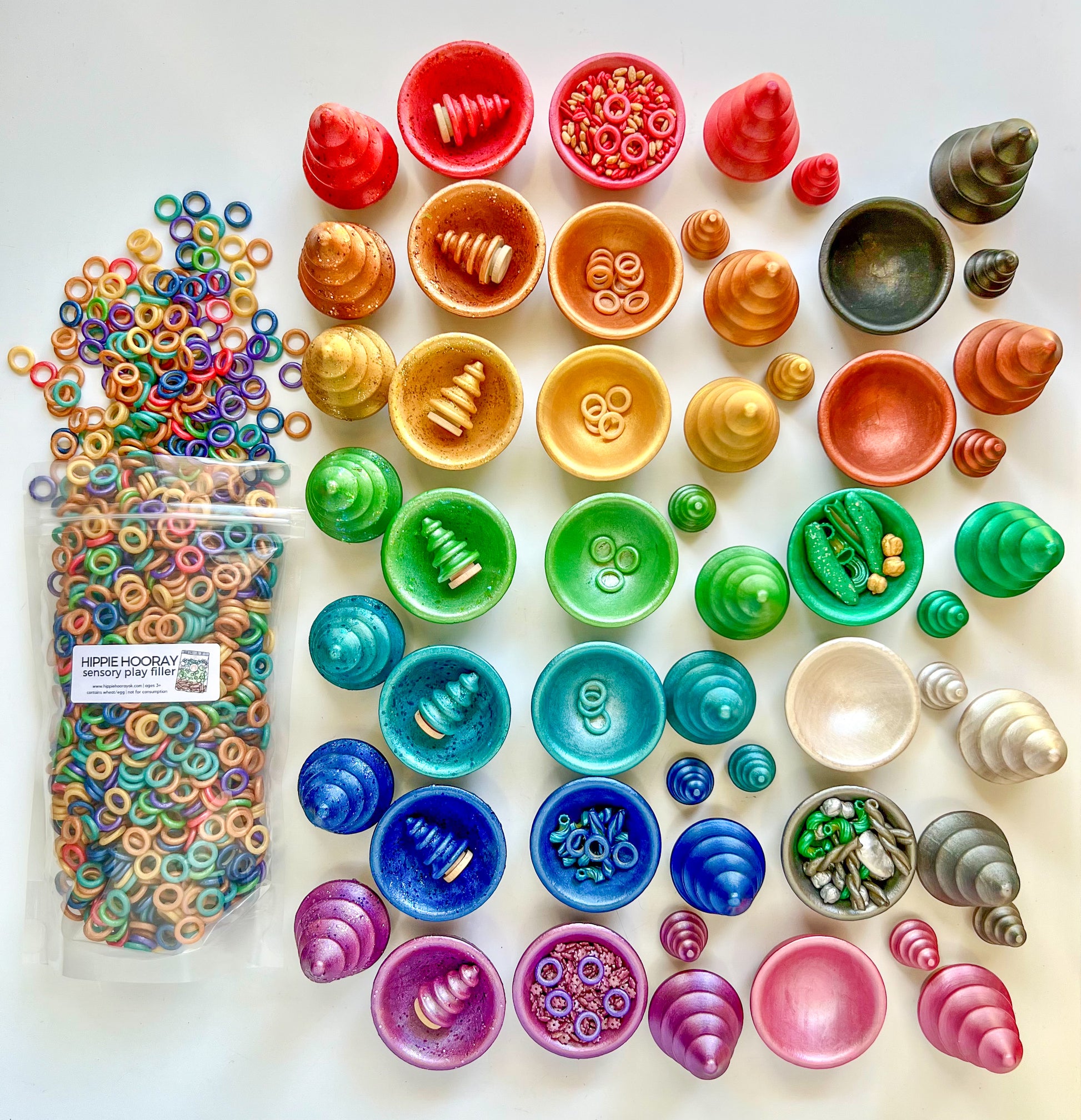 Hippie Hooray rainbow ring pasta and wooden play bowls and trees